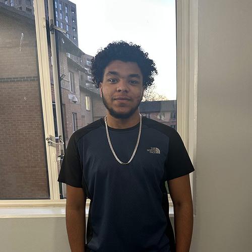 Student Oliver Toure stood in university accommodation
